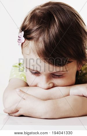 Portrait of little cute child girl expressing sadness (Gestures body language facial expressions depression crisis concept)