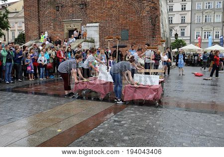 CRACOW POLAND - JULY 5 2017: 30th Street - International Festival of Street Theaters in Cracow Poland. An Odyssey Towards New Shores - a street parade