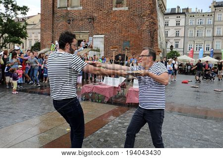 CRACOW POLAND - JULY 5 2017: 30th Street - International Festival of Street Theaters in Cracow Poland. An Odyssey Towards New Shores - a street parade