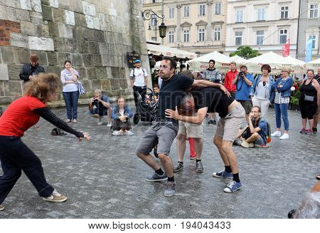 CRACOW POLAND - JULY 5 2017: 30th Street - International Festival of Street Theaters in Cracow Poland. An Odyssey Towards New Shores - a street parade