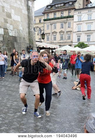 CRACOW POLAND - JULY 5 2017: 30th Street - International Festival of Street Theaters in Cracow Poland. An Odyssey Towards New Shores - a street parade