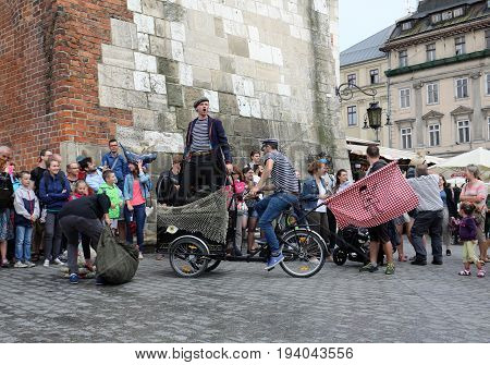 CRACOW POLAND - JULY 5 2017: 30th Street - International Festival of Street Theaters in Cracow Poland. An Odyssey Towards New Shores - a street parade