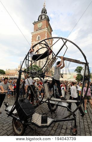 CRACOW POLAND - JULY 5 2017: 30th Street - International Festival of Street Theaters in Cracow Poland. An Odyssey Towards New Shores - a street parade