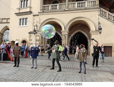CRACOW POLAND - JULY 5 2017: 30th Street - International Festival of Street Theaters in Cracow Poland. An Odyssey Towards New Shores - a street parade