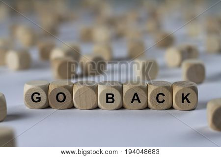 Go Back - Cube With Letters, Sign With Wooden Cubes