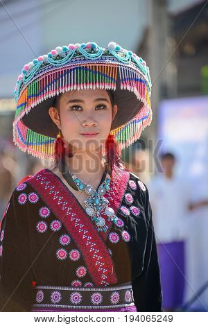CHIANGMAI THAILAND - JANUARY 25 2015: Hill Indigenous girl with local traditional costume in parade of 22nd Traditional Skirt Fabric and The Indigenous Product and Culture Festival in Mae Chaem Chiangmai Thailand