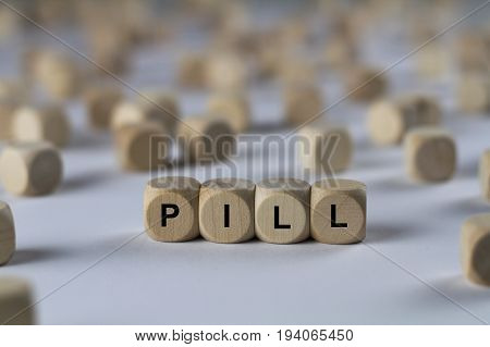 Pill - Cube With Letters, Sign With Wooden Cubes