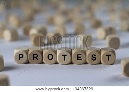 Protest - Cube With Letters, Sign With Wooden Cubes