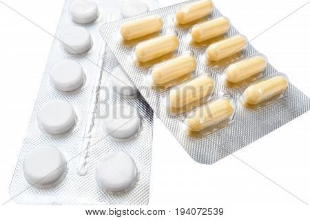 Medicine pills packed in blisters isolated Medicine concept