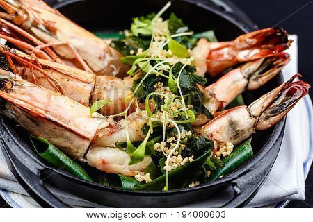 Royal prawns served with herbs and quinoa.