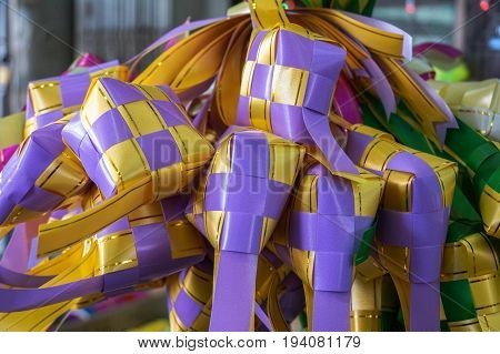 Colourful ketupat icon decorated display of the festival of Eid.Its also known Hari Raya Aidilfitri or Hari Raya Puasa,falls on the first day of Syawal,the 10th month of the Hijrah (Islamic) calendar.