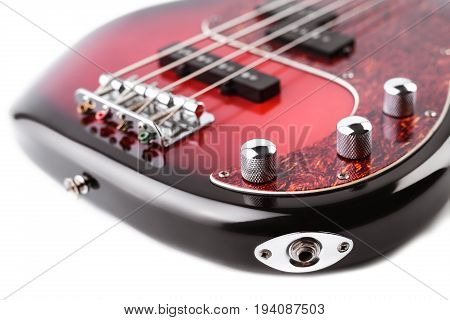 Metallic Volume Treble Guitar Bass Knobs. Electric Guitar. Red Electric Bass Guitar Close-up. Musica