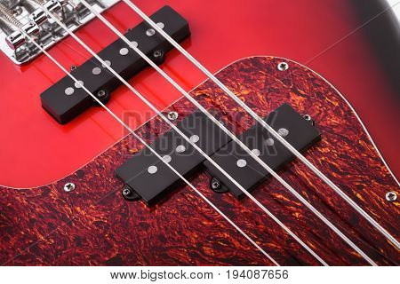 Metallic Volume Treble Guitar Bass Knobs. Electric Guitar. Red Electric Bass Guitar Close-up. Musica