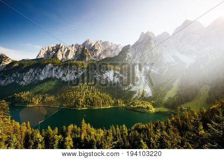 Great azure alpine lake Vorderer Gosausee. Picturesque and gorgeous morning scene. Salzkammergut is a famous resort area located in the Gosau Valley in Upper Austria. Dachstein glacier. Beauty world.