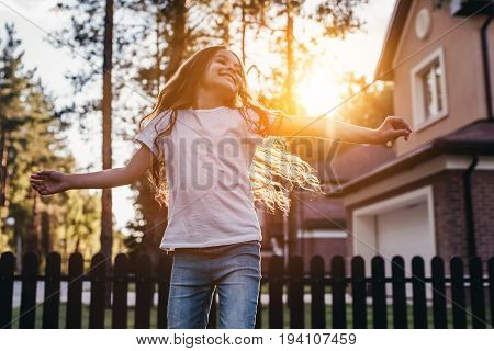 Little Girl On Backyard