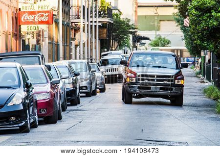 New Orleans, Usa - July 8, 2015: Old Town Buildings And Street With Coca Cola Sign