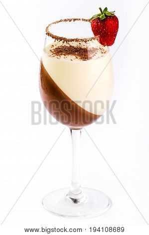 Dessert pannacotta with strawberries and chocolate in a glass on a white background