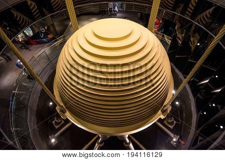 TAIPEI TAIWAN - FEBRUARY 14 2017 : Tuned mass damper of Taipei 101 a harmonic absorber mounted in structures to reduce the amplitude of mechanical vibrations seen from 89th observatory floor.