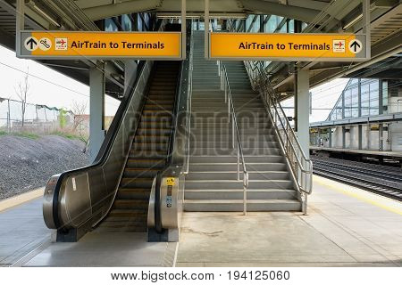 NEWARK, NEW JERSEY, USA - APRIL 25, 2016: Escalator and stairs at a platform of Newark Liberty International Airport train station