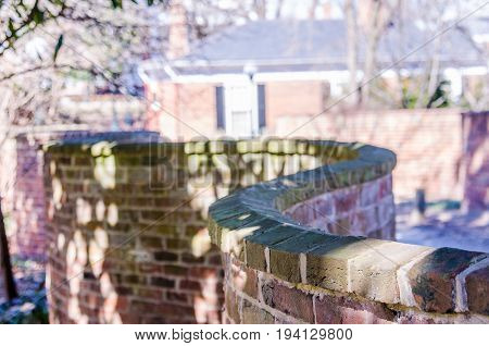 Charlottesville USA - February 27 2014: Thomas Jefferson's one brick thick curved crinkle crankle crinkum crankum serpentine ribbon or wavy wall architecture