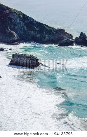 Central California coast with beach cliffs and blue ocean in Big Sur