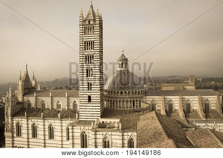 Italy Siena - December 26 2016: the view from facciatone of Duomo di Siena or Metropolitan Cathedral of Santa Maria Assunta on December 26 2016 in Siena Tuscany Italy.