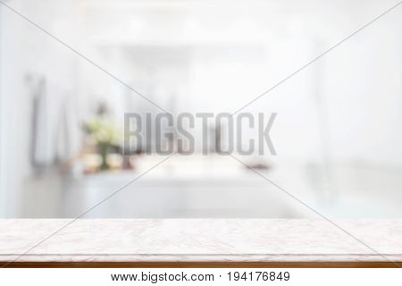 Empty pink marble top table for product display montage with blurred bathroom interior Bckground. Products Display Concept.