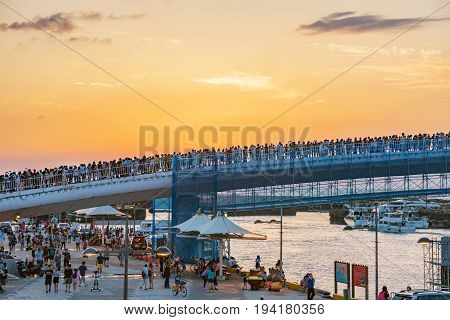 TAIPEI TAIWAN - MAY 29: This is a view of lover's bridge in fisherman's wharf it is a famous bridge where couples come to view the sunset in the Tamsui area on May 29 2017 in Taipei