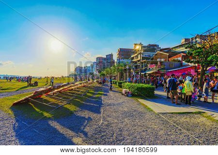 TAIPEI TAIWAN - MAY 29: This is the riverside market and park area whre many tourists come to buy food and souvenirs in Tamsui on May 29 2017 in Taipei