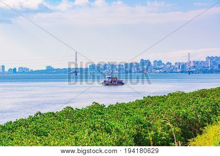 Scenic view of boats in the river in Taipei