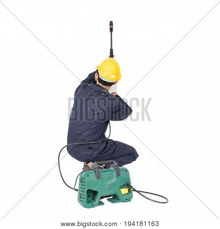 Young Man Sitting And Holding High Pressure Water Gun