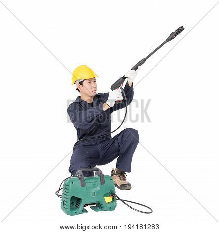 Young Man Sitting And Holding High Pressure Water Gun