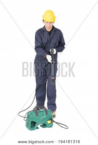 Young Man Stand And Holding High Pressure Water Gun