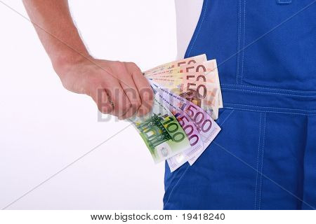 O euro pieniędzy w ręku