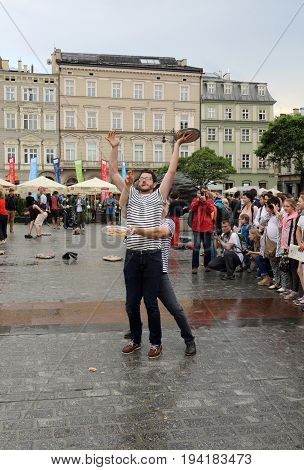 CRACOW POLAND - JULY 5 2017: 30th Street - International Festival of Street Theaters in Cracow Poland. An Odyssey Towards New Shores - a street parade
