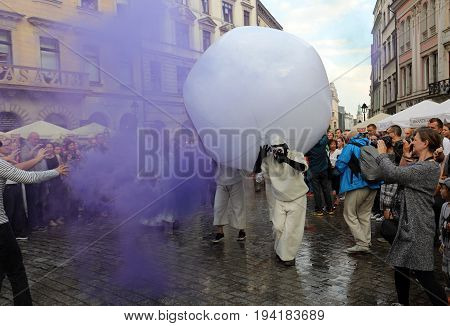 CRACOW POLAND - JULY 5 2017: 30th Street - International Festival of Street Theaters in Cracow Poland. An Odyssey Towards New Shores - a street parade