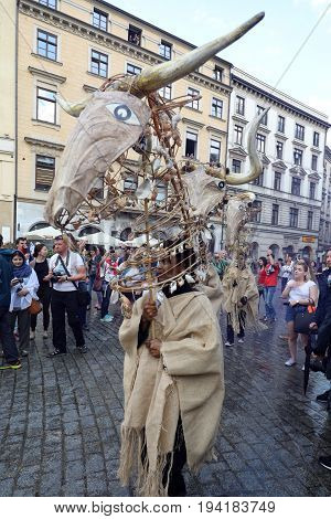 CRACOW POLAND - JULY 5 2017: 30th Street - International Festival of Street Theaters in Cracow Poland. An Odyssey Towards New Shores - a street parade