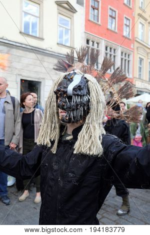 CRACOW POLAND - JULY 5 2017: 30th Street - International Festival of Street Theaters in Cracow Poland. An Odyssey Towards New Shores - a street parade