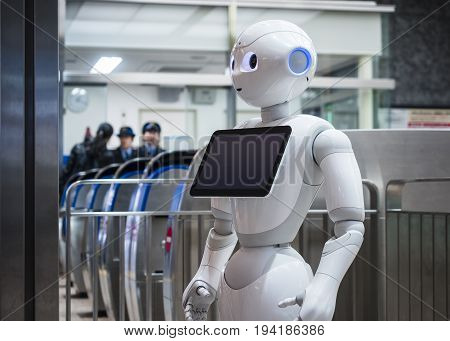 KANAZAWA JAPAN - APR 11 2017 : Pepper Robot Assistant with Information screen at Train station Tourism Japan