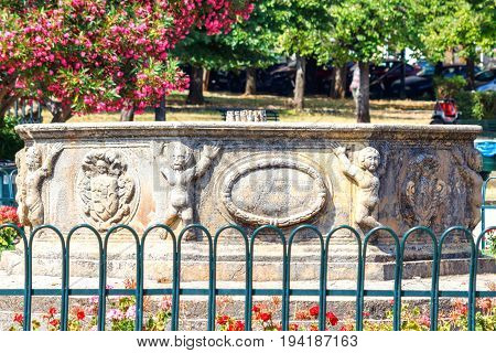 CORFU ISLAND, GREECE - JUNE 26, 2017: Little humans monument in park of Corfu island, Greece