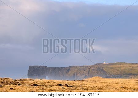 Iceland landscape with a lighthouse in the background