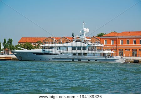 View of the beautiful architecture and yacht along canals in Venice Italy