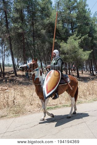 Tiberias Israel July 01 2017 : Participants in the reconstruction of Horns of Hattin battle in 1187 left the camp on horseback and ride go to the battle site near TIberias Israel