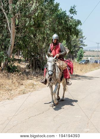 Tiberias Israel July 01 2017 : Participants in the reconstruction of Horns of Hattin battle in 1187 left the camp on horseback and ride go to the battle site near TIberias Israel