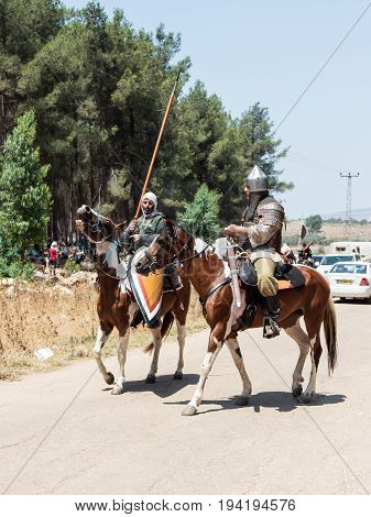 Tiberias Israel July 01 2017 : Participants in the reconstruction of Horns of Hattin battle in 1187 left the camp on horseback and ride go to the battle site near TIberias Israel