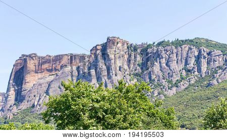 Green trees and rock mountains at sunset in Greece, Corfu
