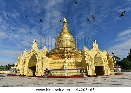 Beautiful nice sky and fly birds at Maha Wizaya Pagodasmall pagoda near shwedagon in haert of YangonMyanma