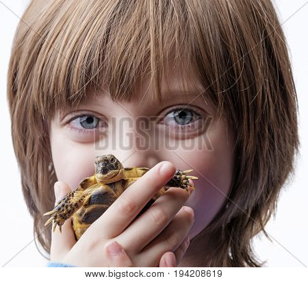 little girl with her pet - tortoise