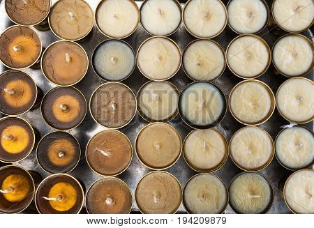 Just now prepared oil icon lamps for fire donations waiting when the oil used in them stiffen. Background image.