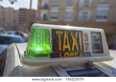 Lorca Spain - May 29 2017: Free taxi with a green light at the central station of Lorca province of Murcia Spain